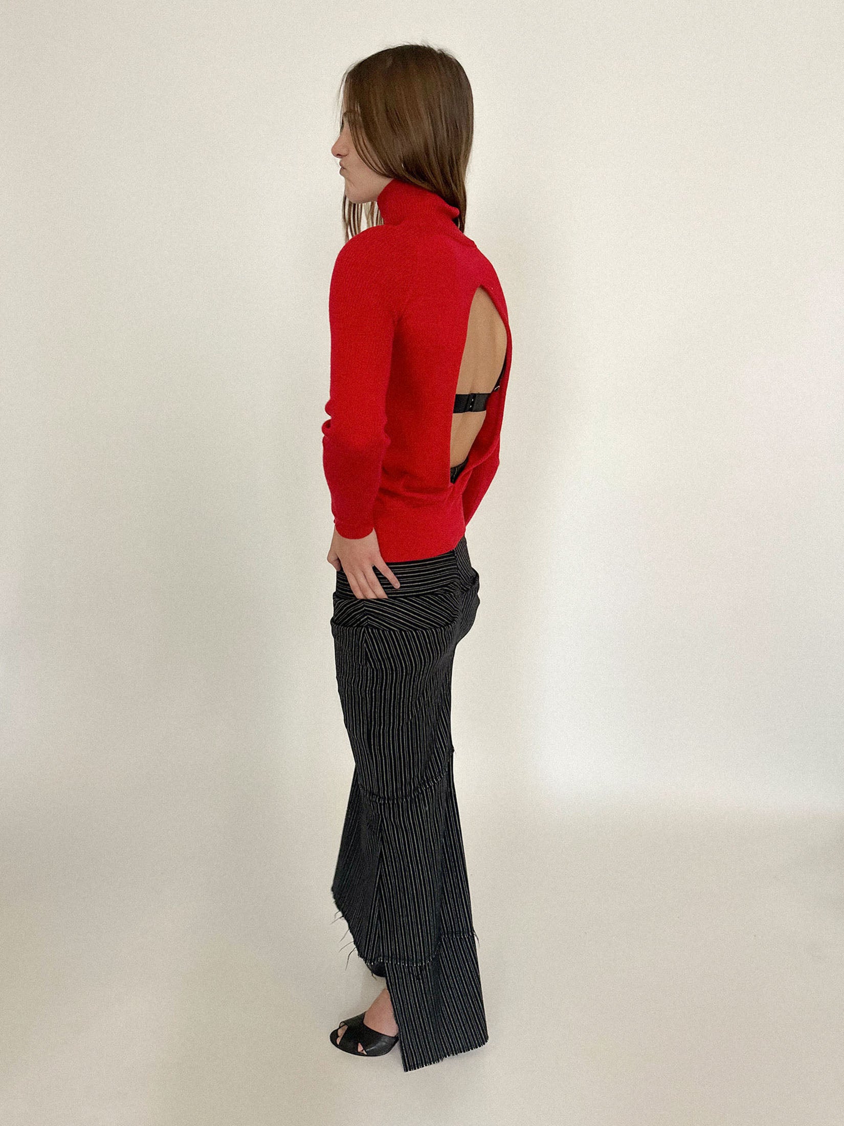 It’s a piece that reveals through control, seducing in structure and skin.