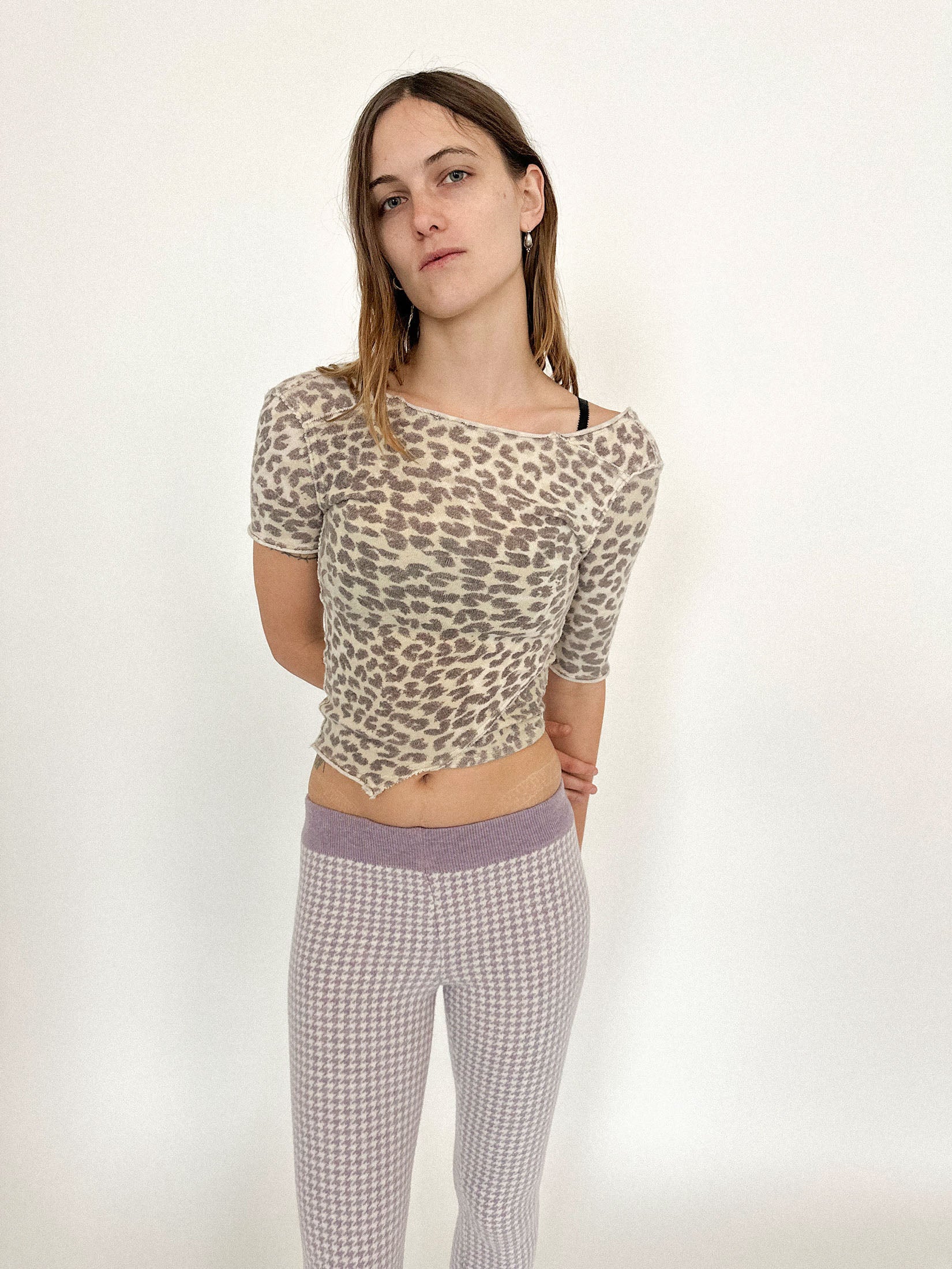 A screen-printed leopard knit t-shirt by Talia Byre, cut close to the body with a quiet precision that borders on obsession.