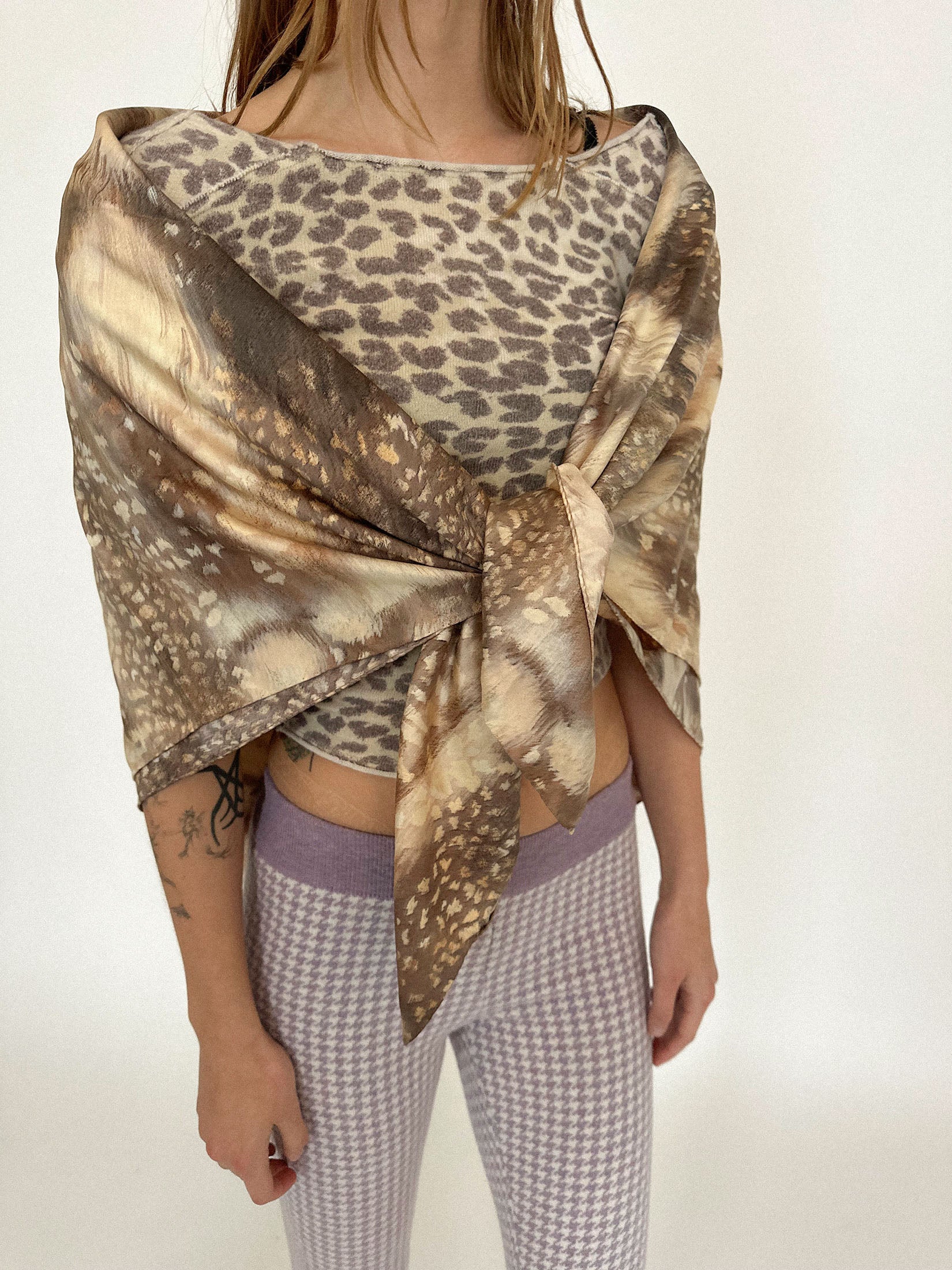 The print catches the light with quiet drama, turning movement into narrative.