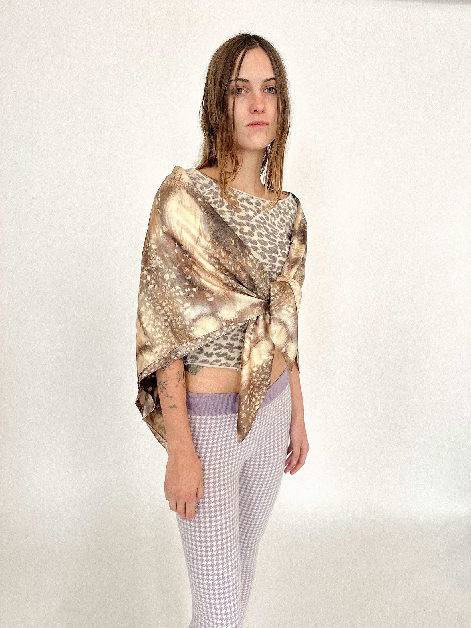 A piece for those who treat getting dressed like an act of improvisation - elegant, instinctual, a little wild.