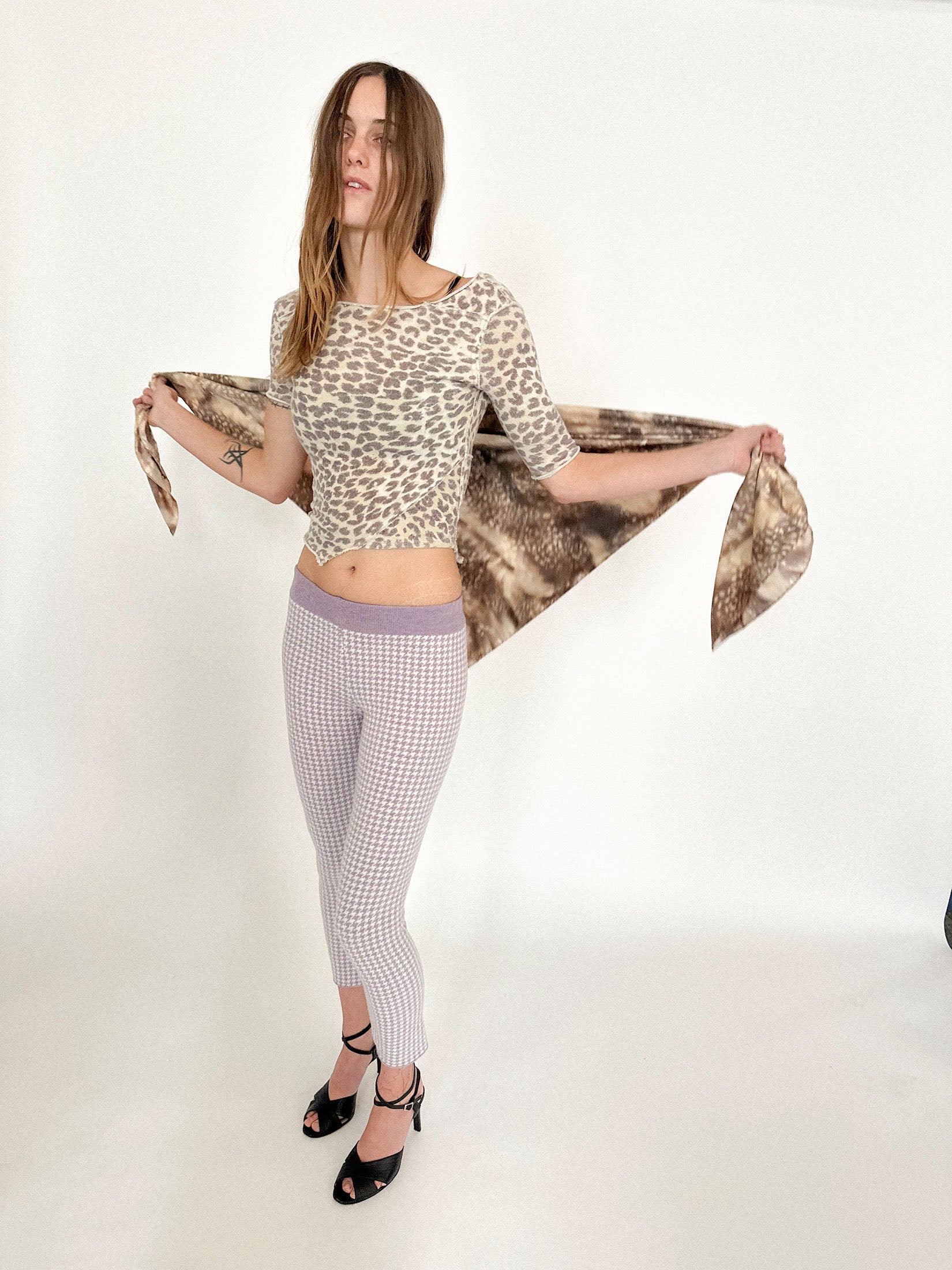 The generous size gives it range: it can slip into the role of a dress, twist into a top, or wrap languidly around the neck or waist.