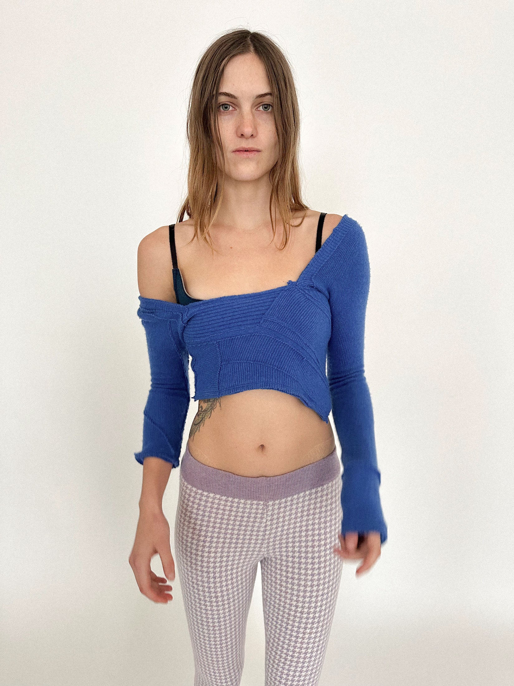A cropped knit by Talia Byre, rendered in a cobalt blue that hums like electricity.
