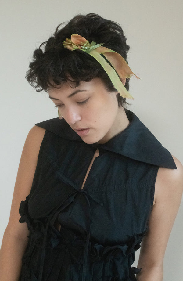 From Chloë Sevigny's personal archive, this vintage headband is a quiet nod to the charm of a bygone era, where the smallest details made the most lasting impressions. 
