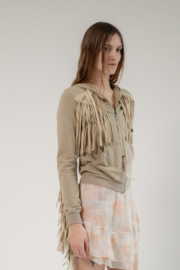 Where Western edge meets Italian elegance, the D&G Fringe Sweatshirt redefines the classic with a seductive twist.