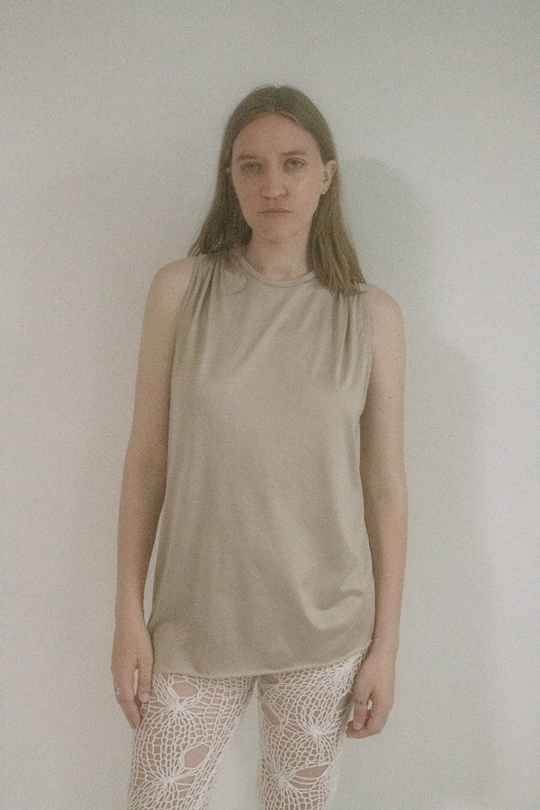 A singular piece from Judy Turner’s New York studio, this tank slips on like a whisper but lingers like a stare. 