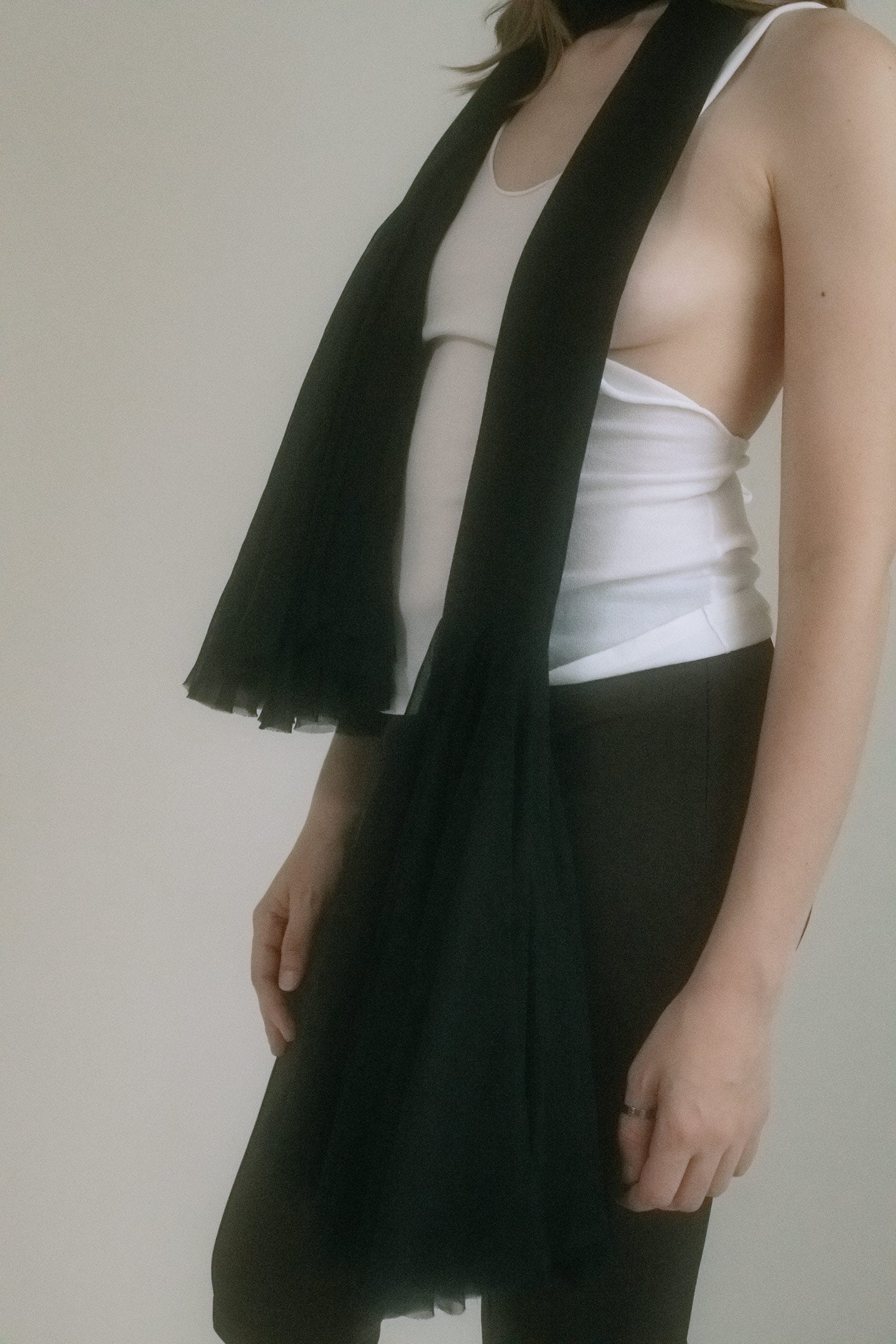 Wrap it loose around the neck, cinch it low on the hips, or let it trail down the back like a lover’s whisper. 