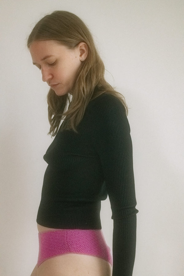 From Judy Turner’s New York studio comes a ribbed knit sweater that feels like a whispered promise. 
