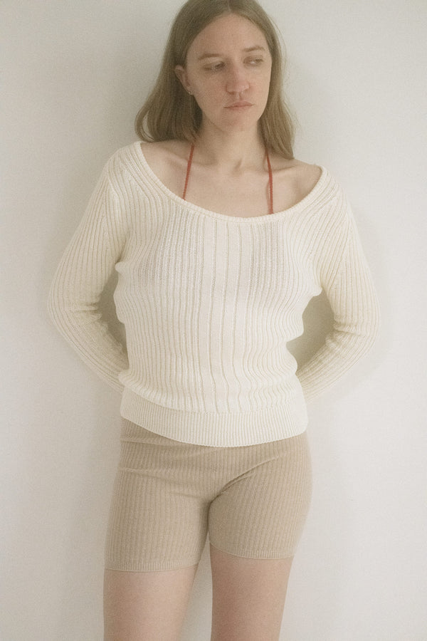 From Judy Turner, a whisper of a knit that clings just enough to cause a stir. 
