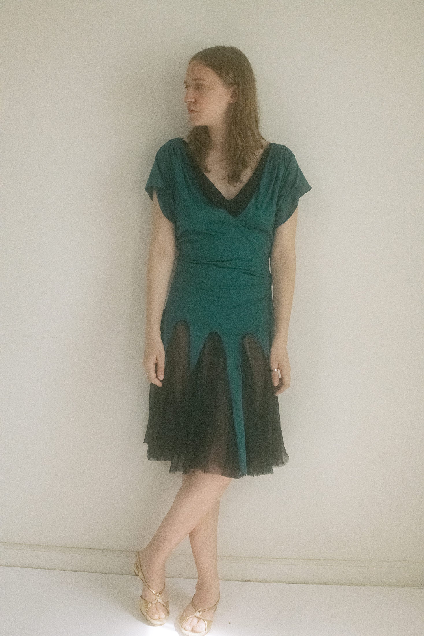 Made in New York, this two-tone mini slips between knit jersey and silk chiffon like it’s changing identities mid-scene. 
