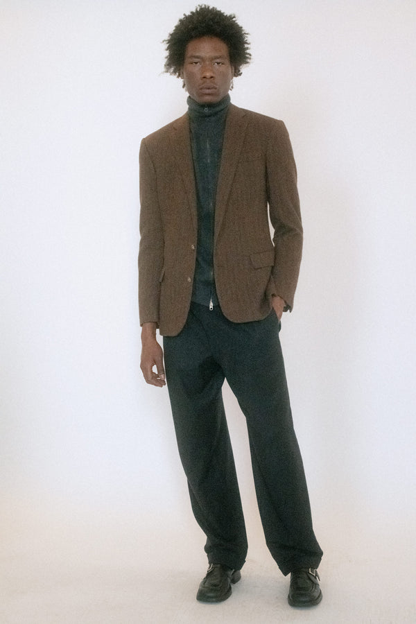 A Ralph Lauren wool blazer with just enough shoulder padding to hint at power.
