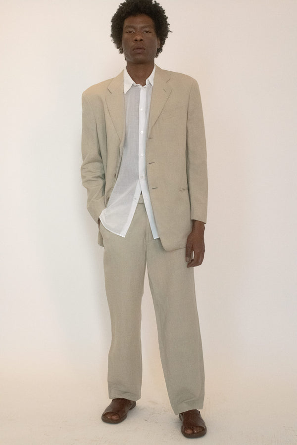 Trousers from Giorgio Armani, cut from a lightweight fabric that slips easily between structure and ease.

