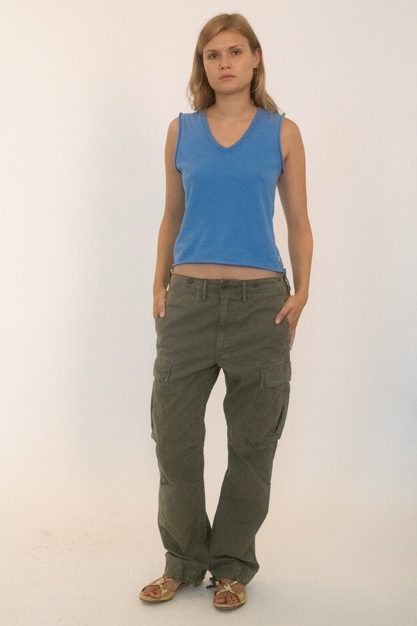 Vintage cargo pants in olive green, cut with quiet precision and built for utility with a hint of menace.
