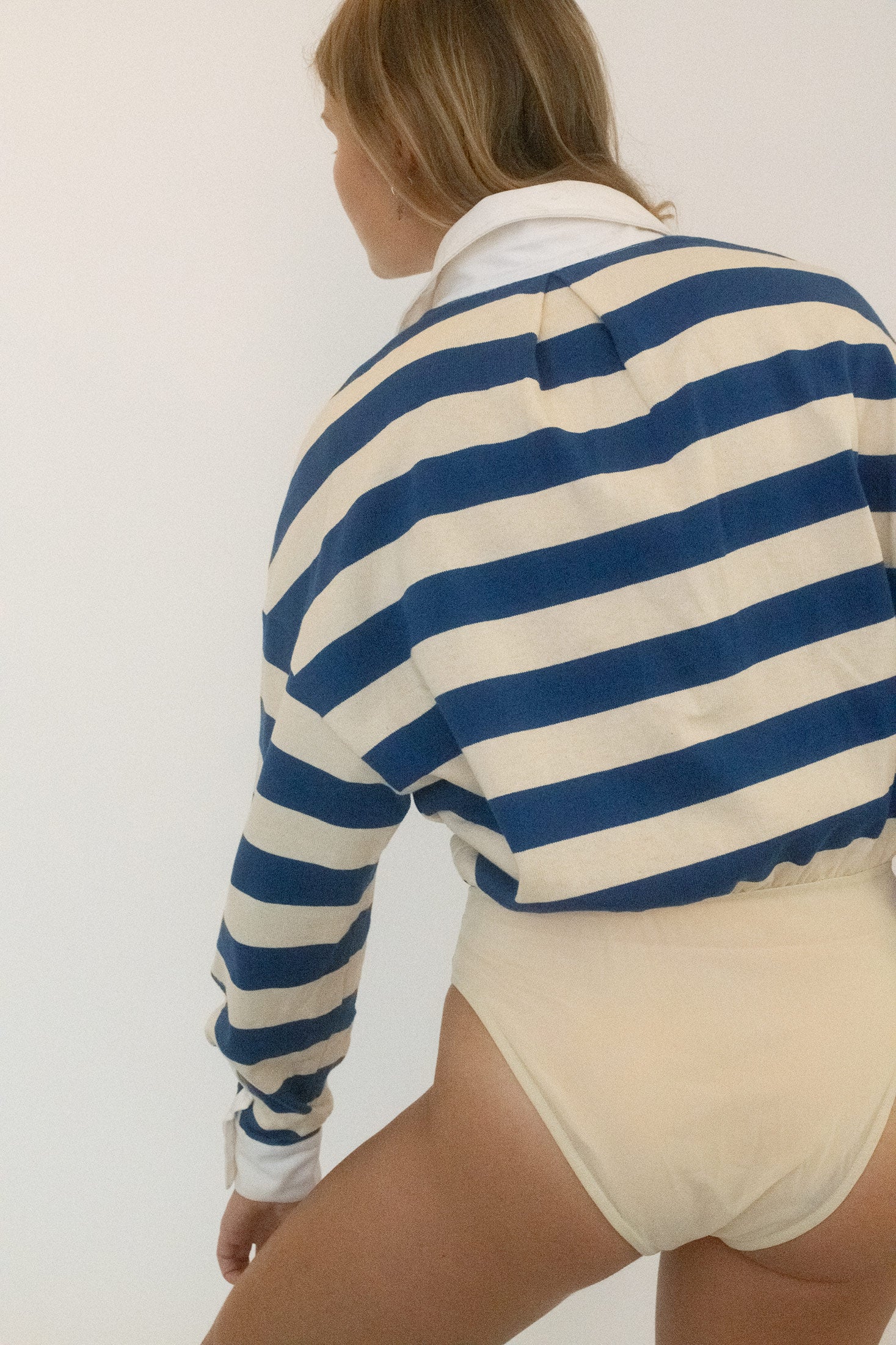 Clean lines, a disciplined silhouette, and a knowing wink underneath.