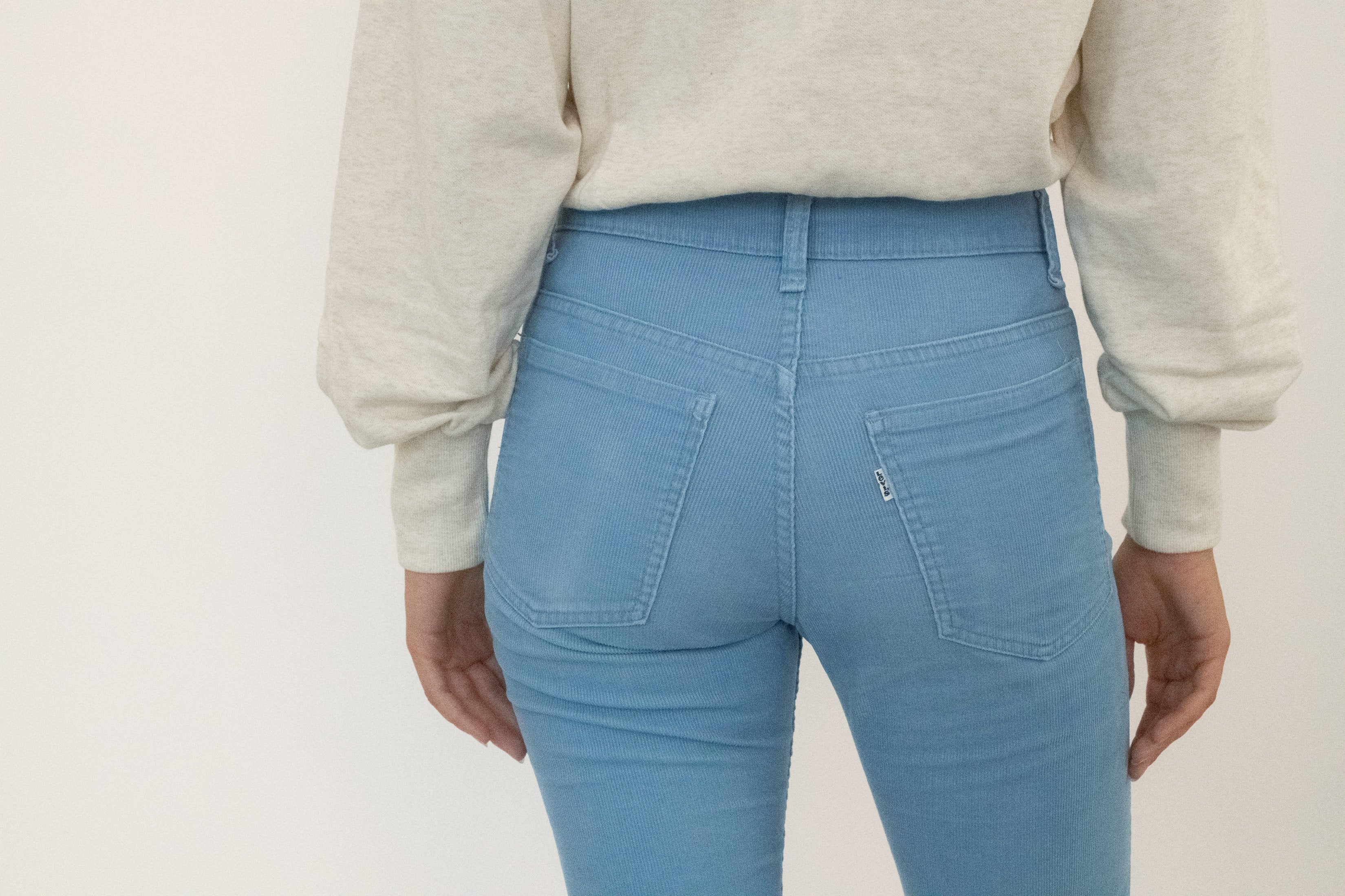 Cut from fine heather grey sweatshirt material, it carries the ease of loungewear but the precision of something meant to be seen.