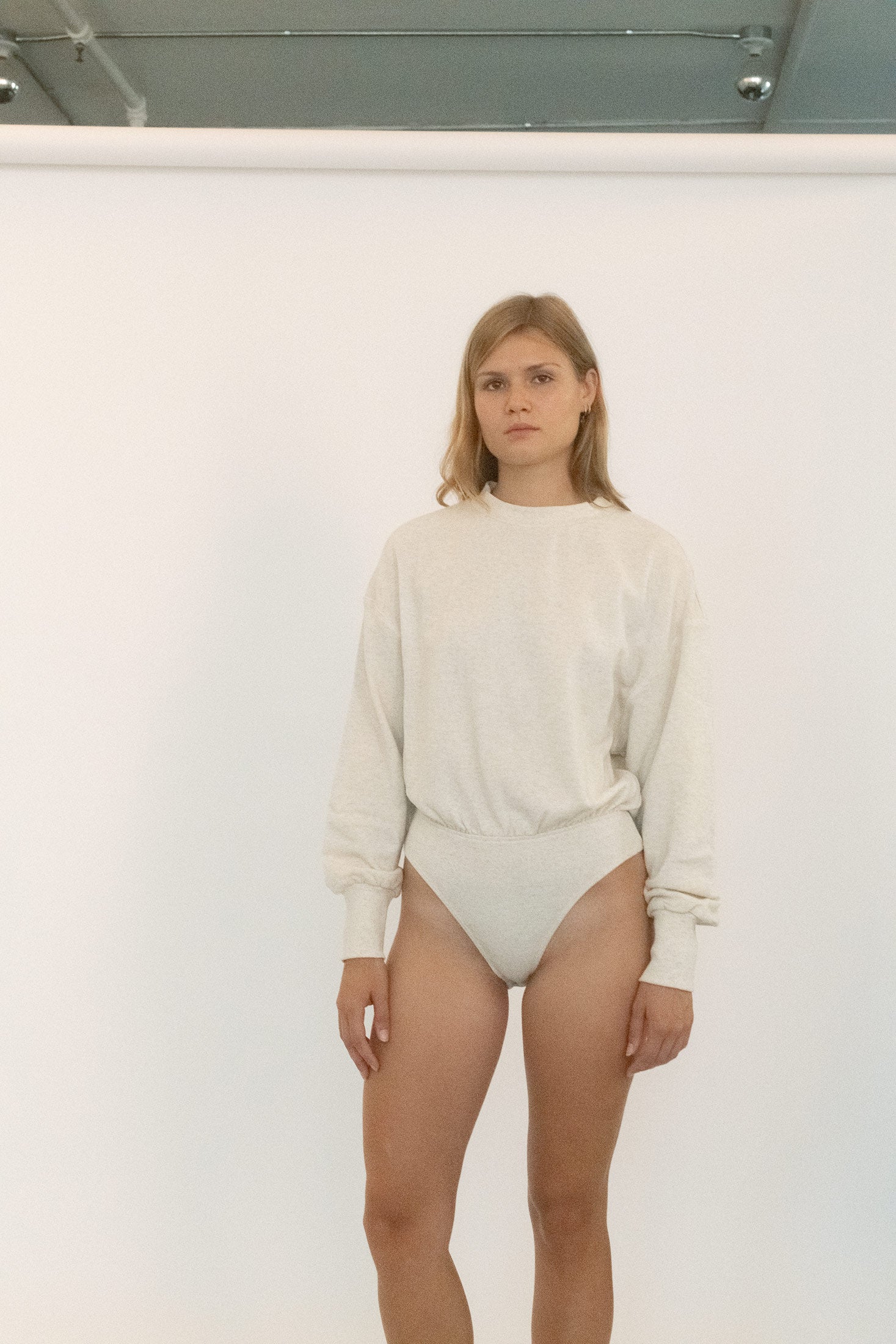 Relaxed, refined, and slightly suggestive - like borrowed clothing that somehow feels made for you.