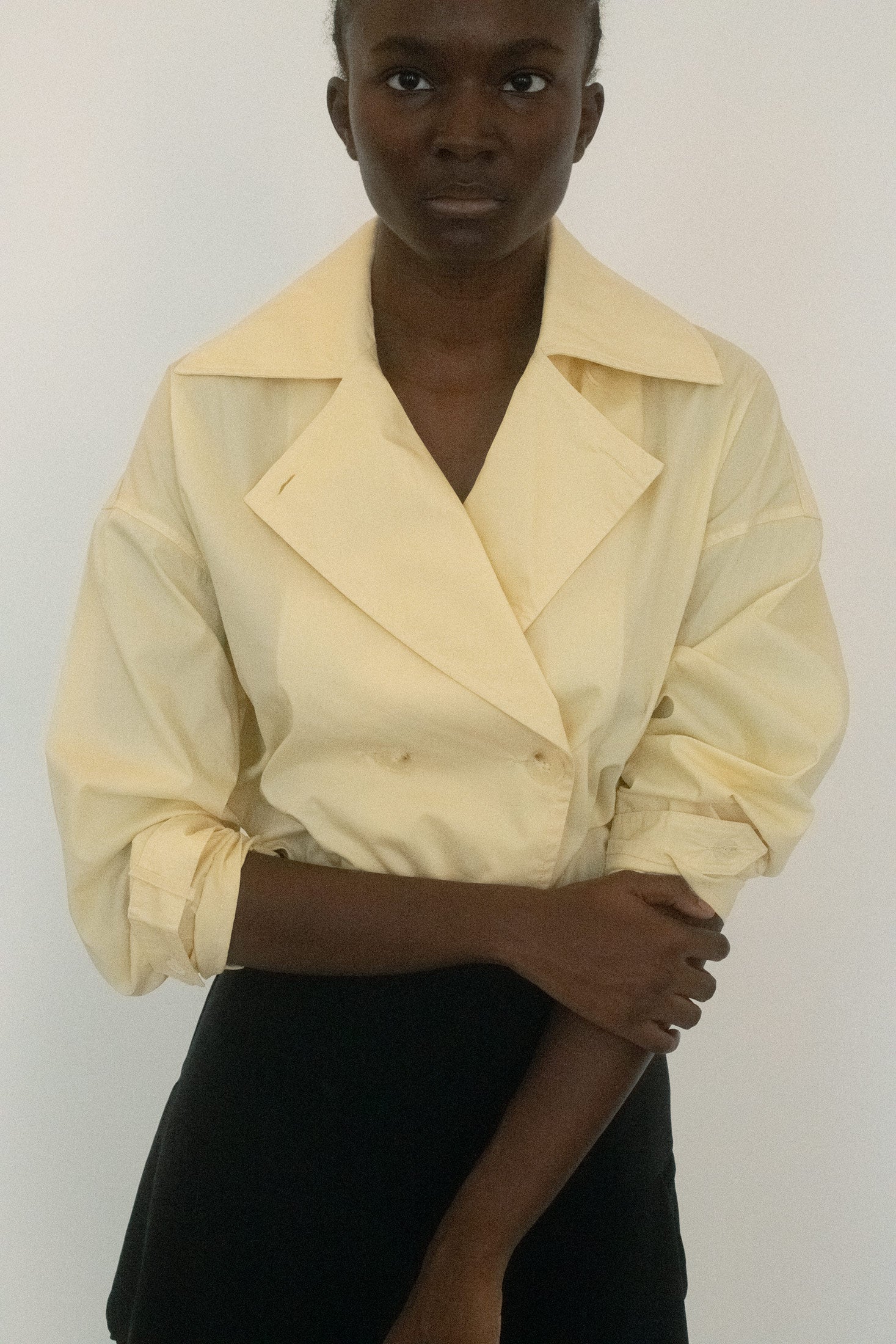 A trench style bodysuit from Stefania, made for the kind of woman who walks into a room and knows the walls are watching.