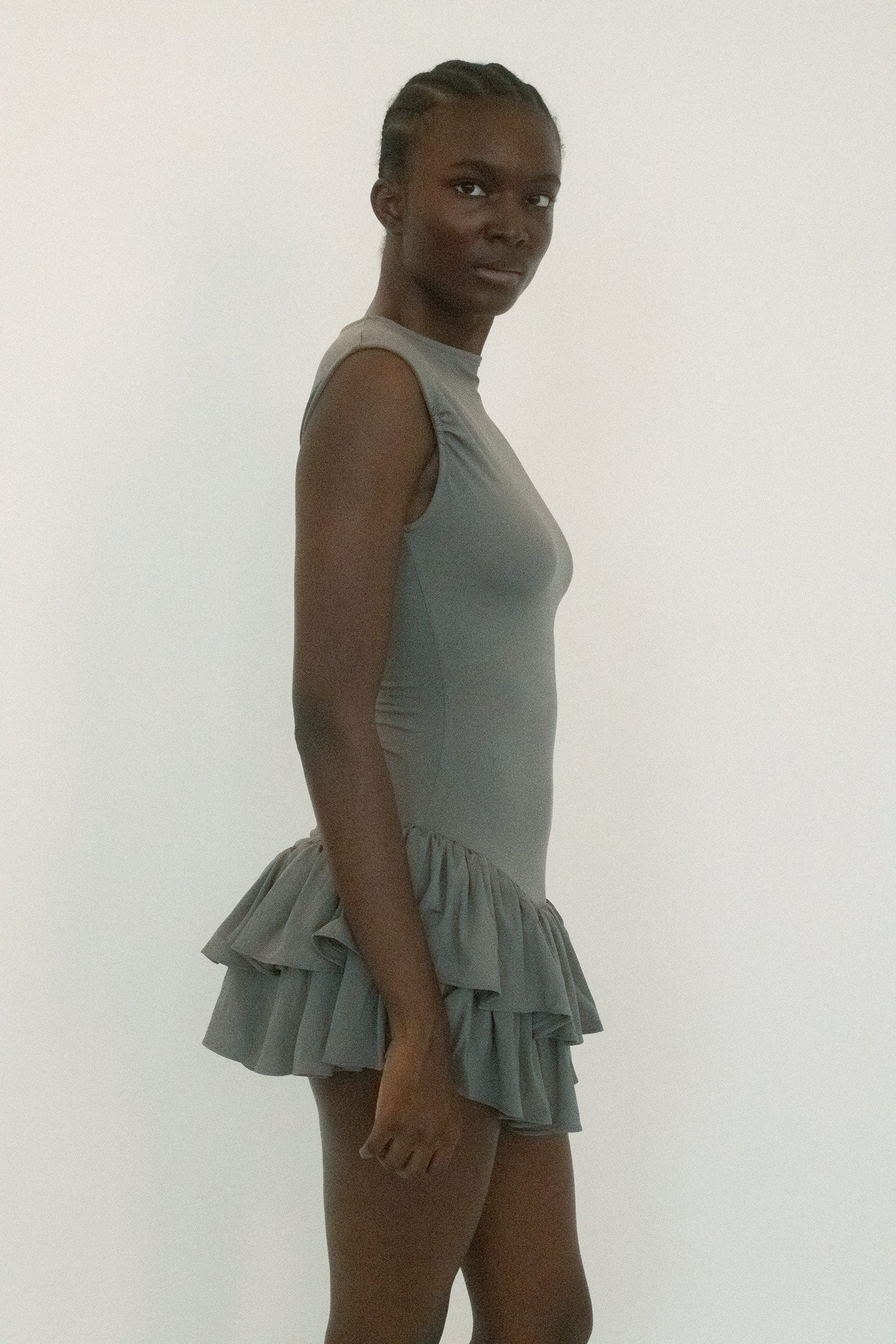 From Belle the Label, a dress that balances structure with tension. 