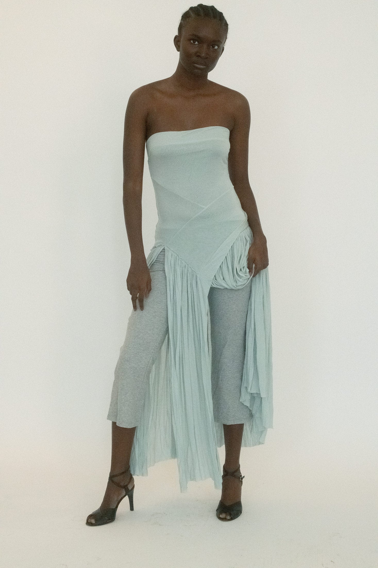 The elastic waistband keeps the line easy, a simple frame for a shape that’s meant to move with you. 