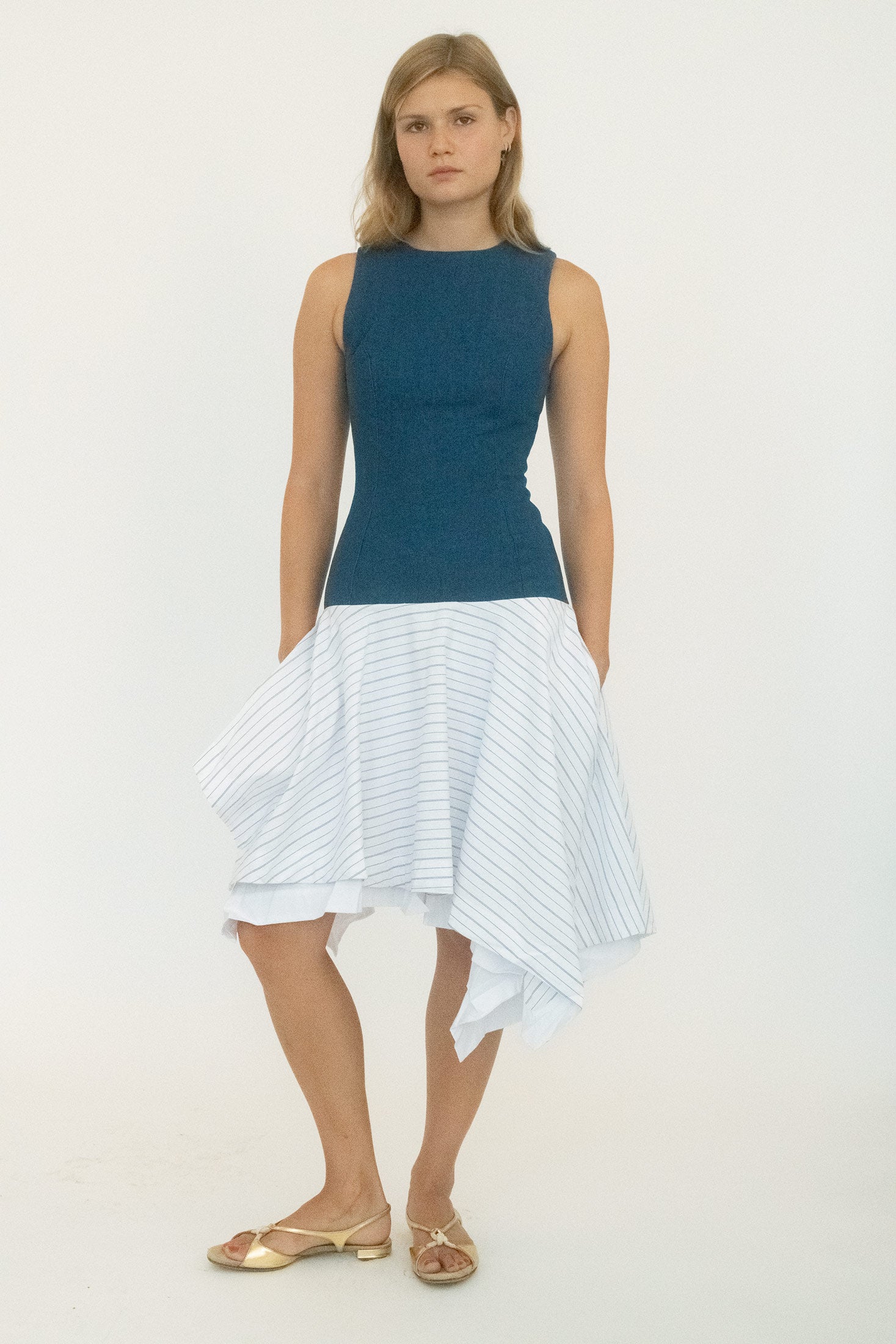 From Belle the Label, a dress built on contrasts: structured up top, fluid below. 