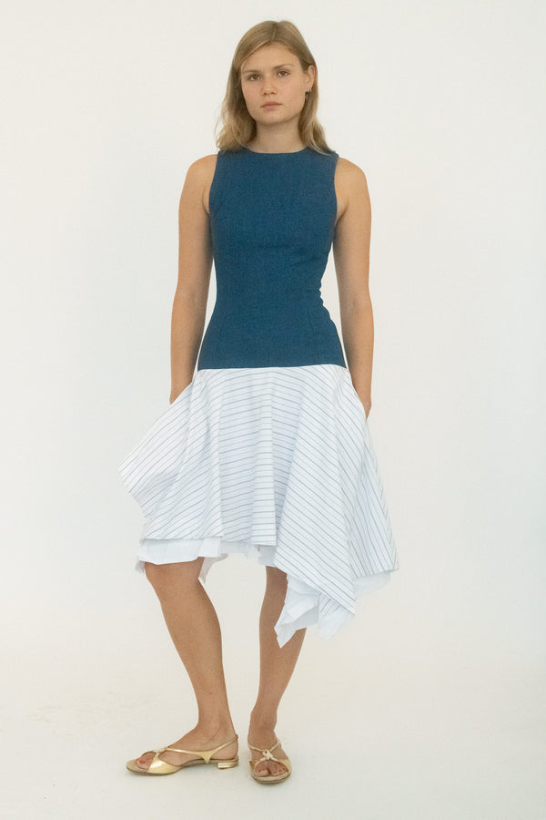 From Belle the Label, a dress built on contrasts: structured up top, fluid below. 