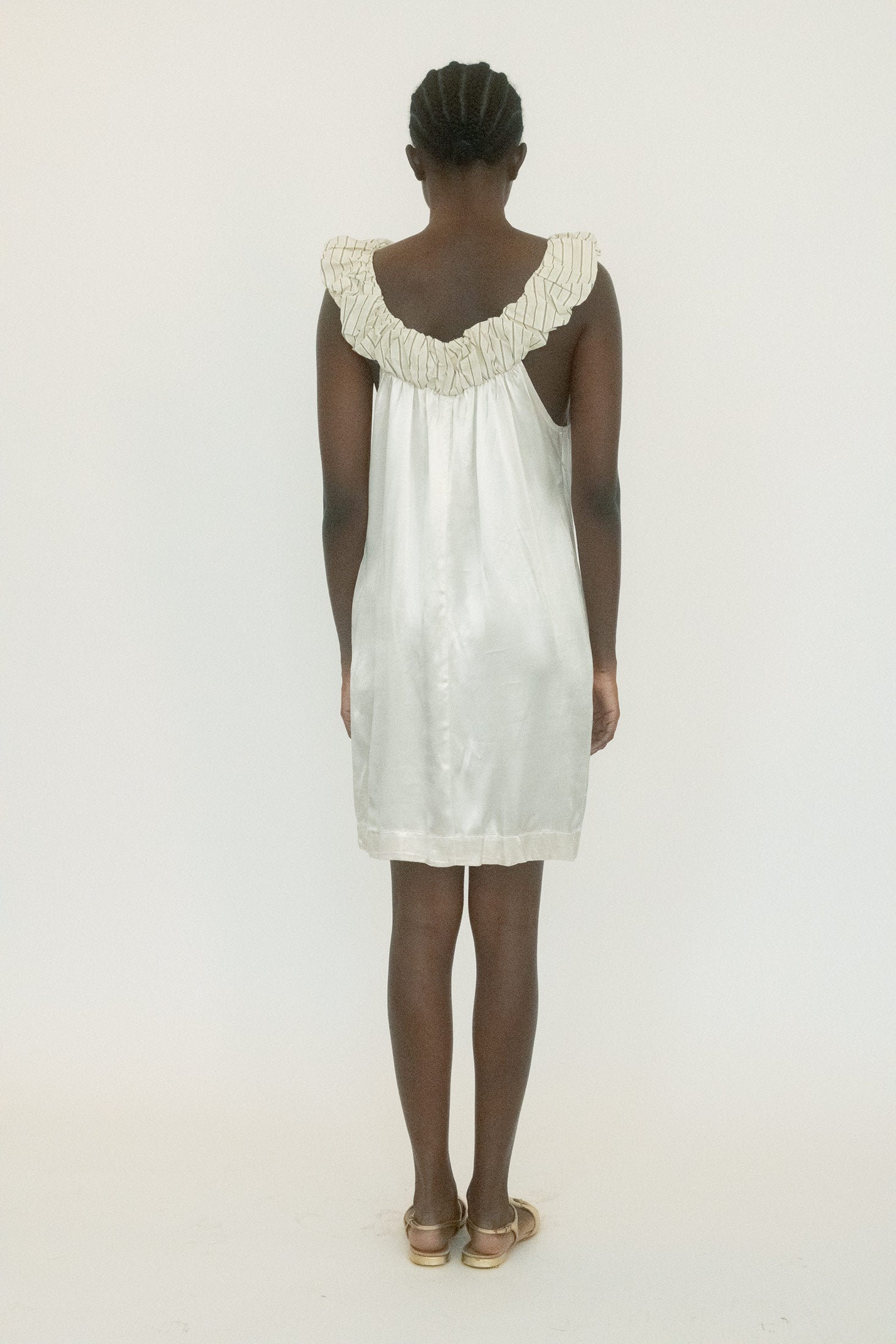 This piece is built to look composed while hinting at something more unruly underneath.