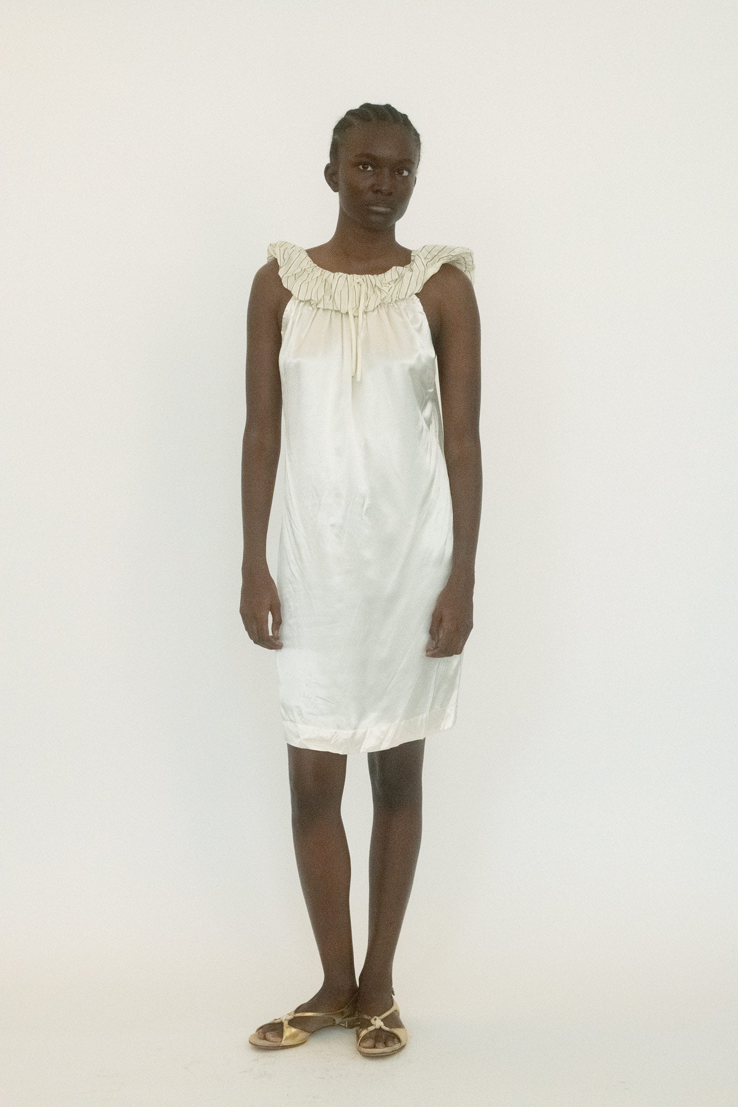 From Belle the Label, a dress that holds still but glints with movement. 