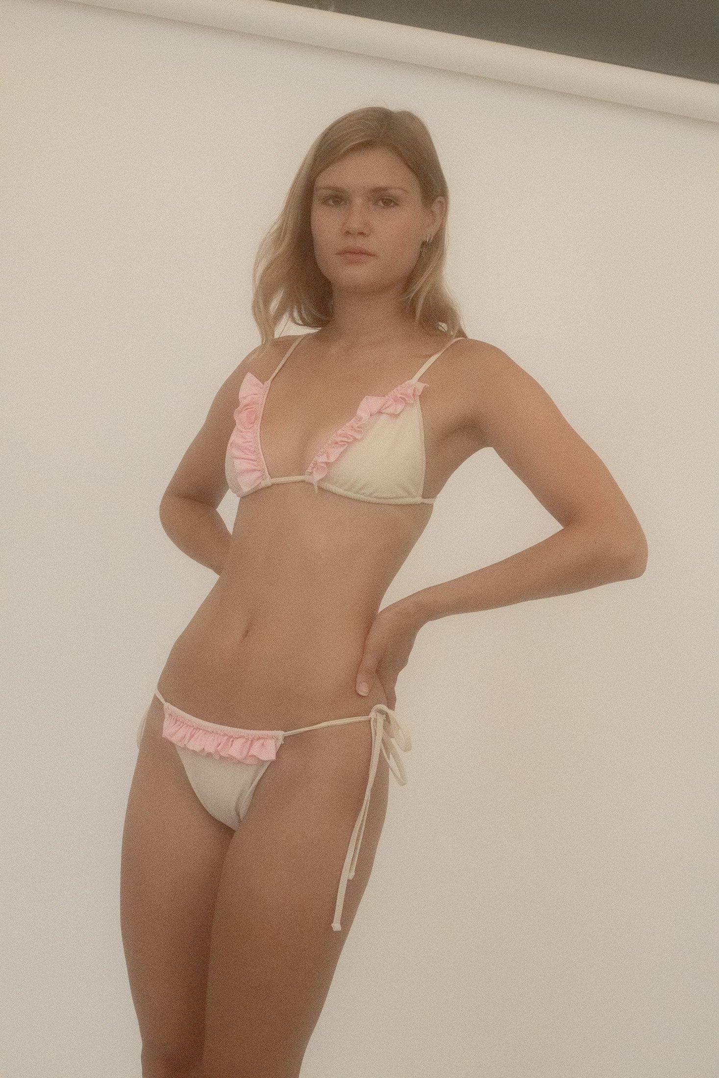 They’re finished with contrasted ruffle detailing that flutters against the skin like a sly afterthought. 