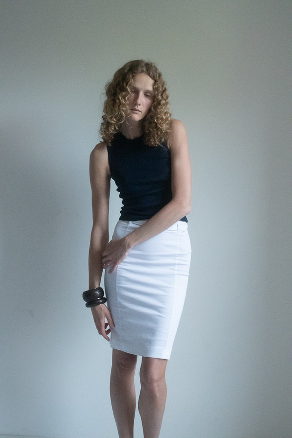 Look up to see a fine knit ribbed sleeveless top,"the Julie" taking center stage. 