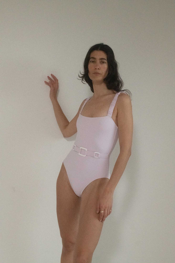 Step into the sultry embrace of vintage allure with the Roxana Salehoun Jumper one piece in ethereal light pink.