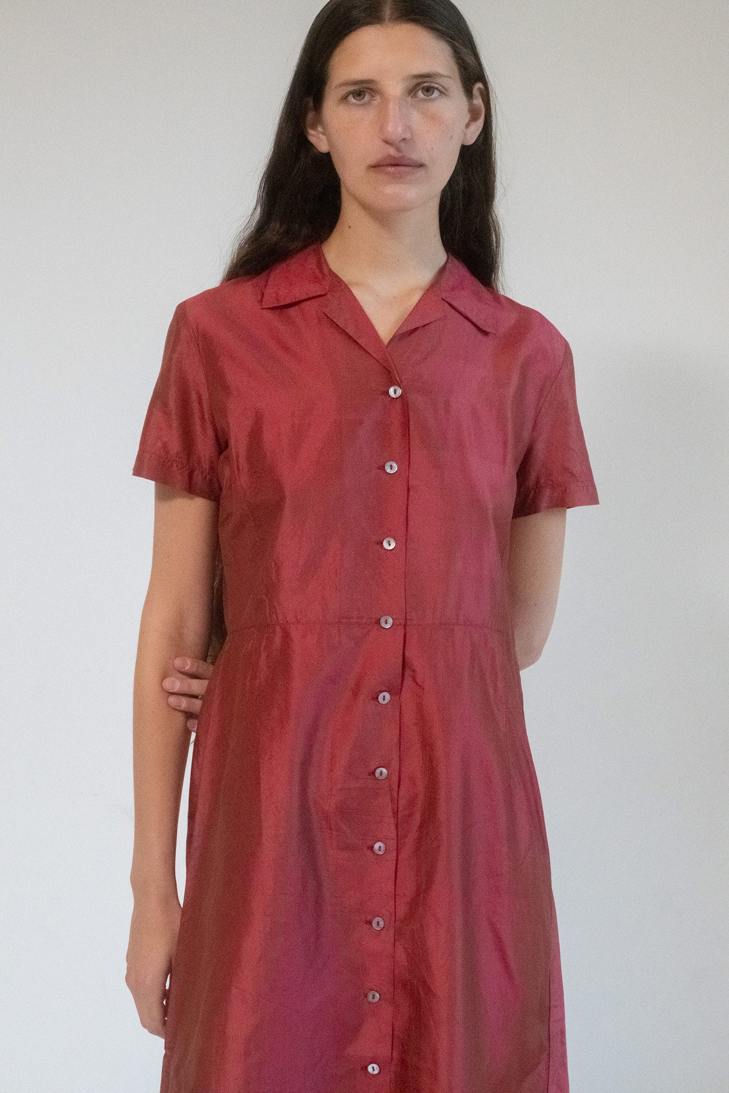 This shirtdress is more than just a garment; it’s a transformative piece that makes a statement of confidence and sophistication. It captures the dynamic spirit of a 1980s film noir heroine—graceful yet bold, mysterious yet undeniably alluring.