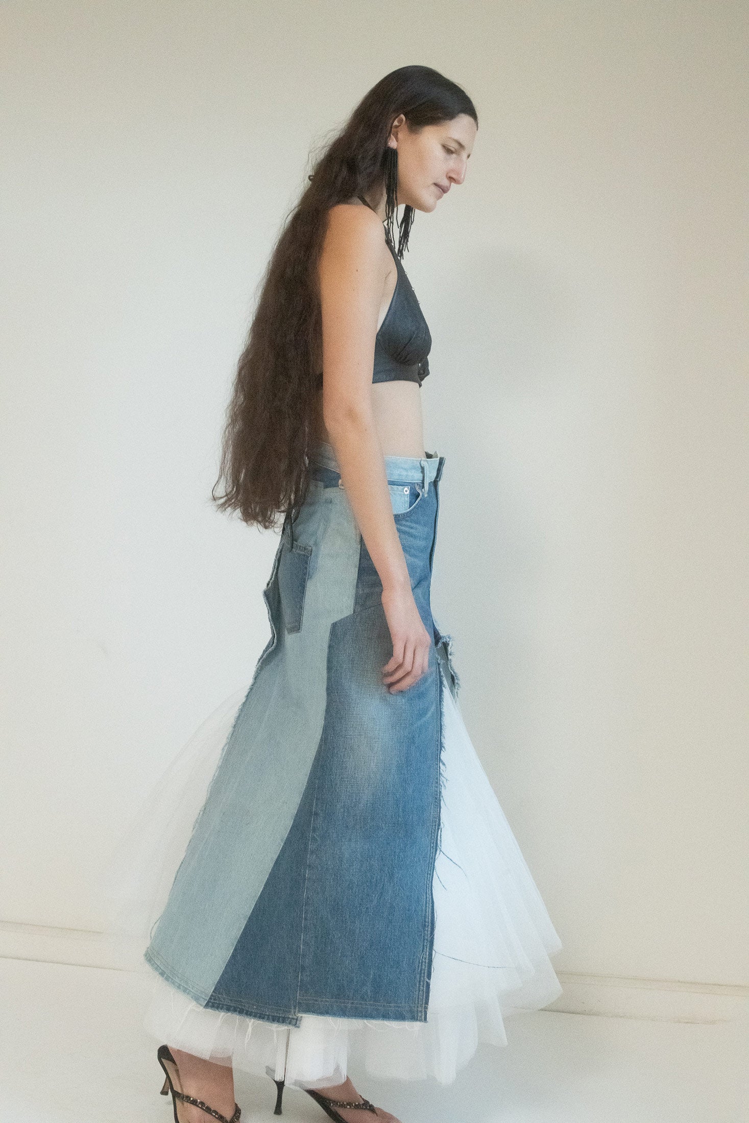 This skirt is unique, a fusion of hard and soft, a juxtaposition of elegance and edge.