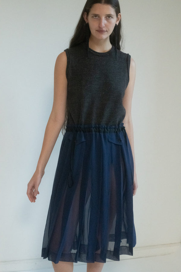 The Comme des Garçons Tricot dress: a silent power that says everything, without saying a word.