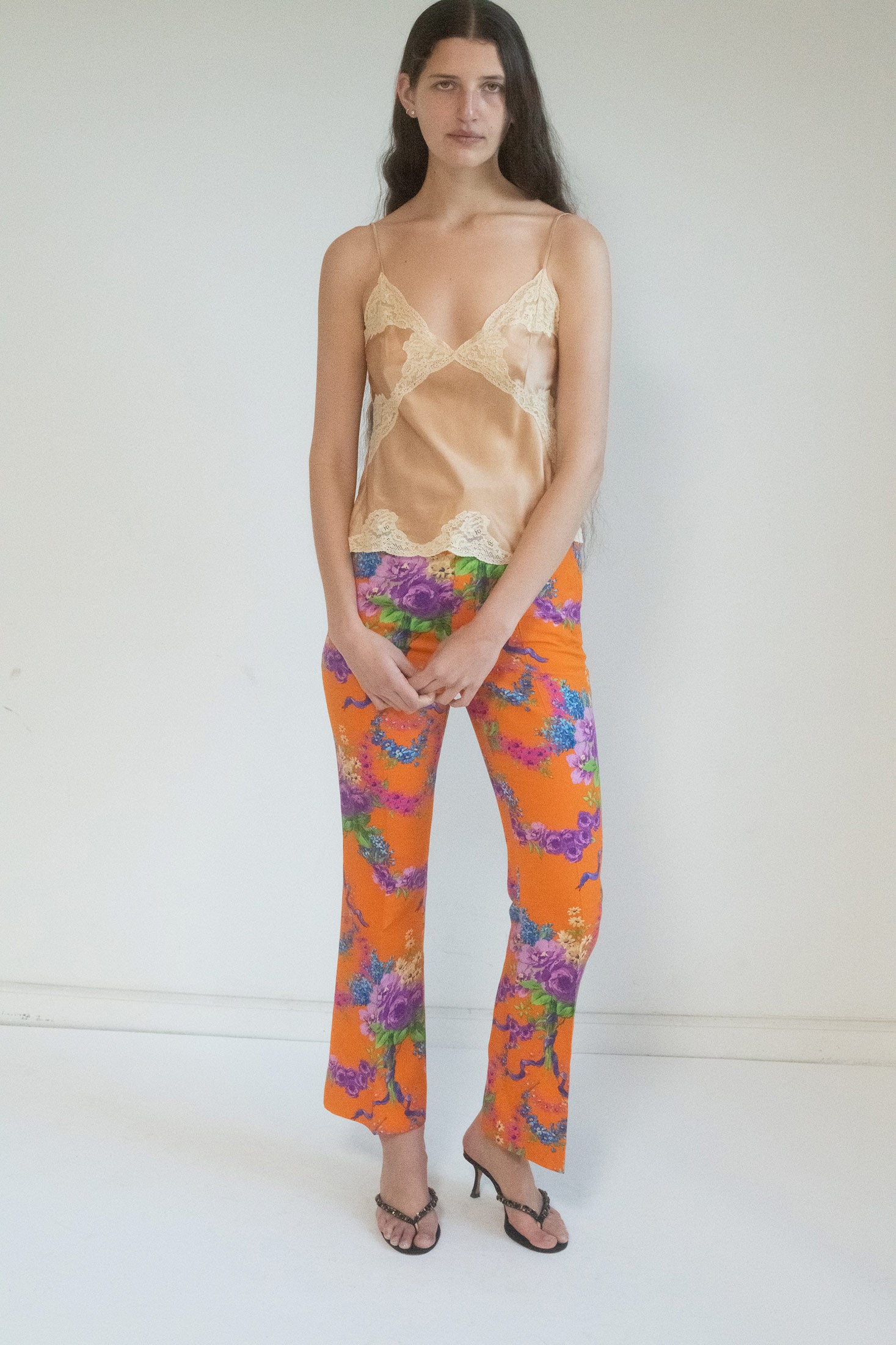 From Chloë Sevigny's personal archive, these high-waisted trousers from Gucci are a bold declaration of individuality. 