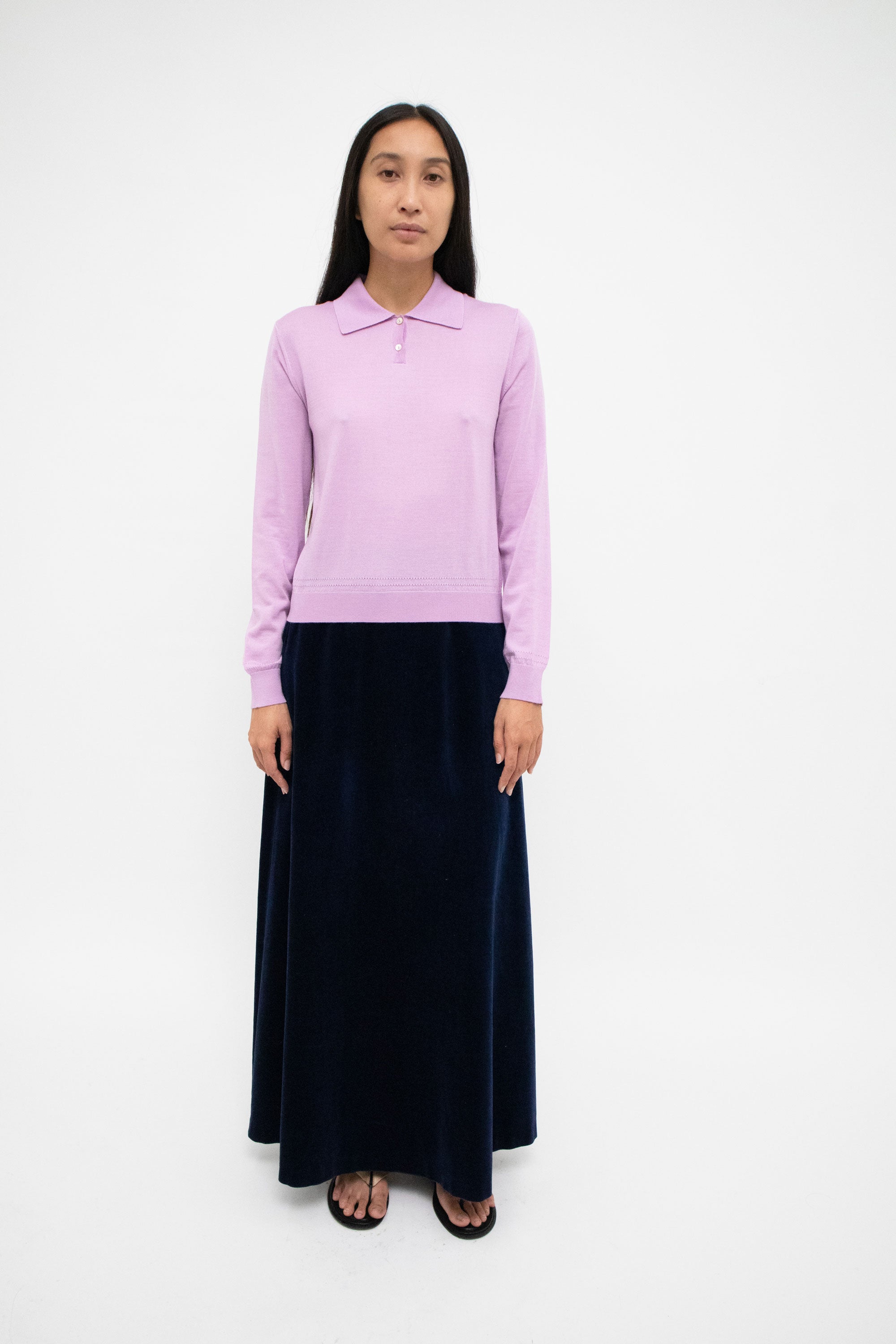 Crafted with precision, this fine-knit polo sweater is more than a mere garment; it's an invitation to indulge in the sensual. 